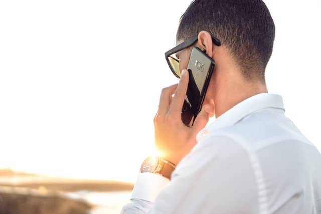 man talking on his cellphone