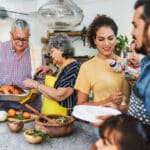 Family preparing Thanksgiving dinner together