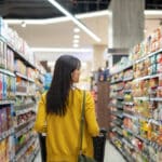 Customer buying groceries in supermarket
